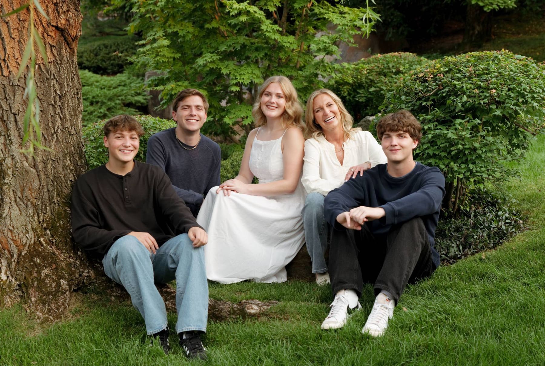 Donna Walker smiling with her family in a garden